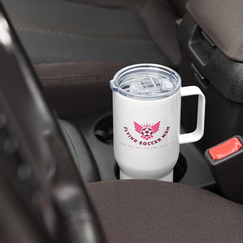Soccer mom stainless steel tumbler with handle resting in a car cup holder, designed for busy lifestyles.