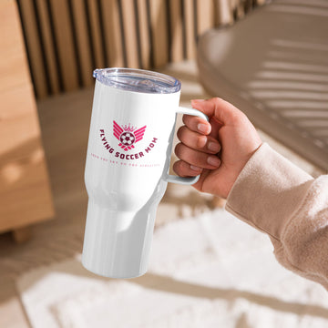 Hand holding a Flying Soccer Mom stainless steel tumbler with handle, perfect for busy mornings and game days.