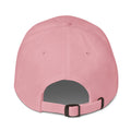 Pink baseball cap with a strap on a white background