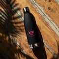 Soccer mom water bottle styled near soccer field for game day