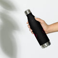 Black soccer mom water bottle held in hand showing back design